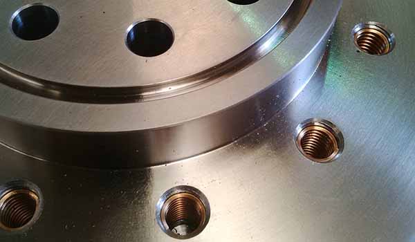 Turned Stainless Steel Hub with thread inserts